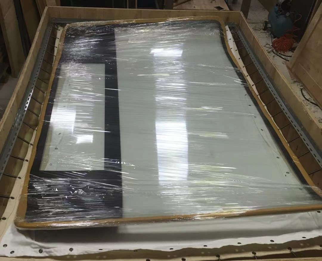 大型鋼化玻璃出口到尼泊爾,彈簧蹦床包裝方案——一次危險品進出口包裝方案的飛躍!